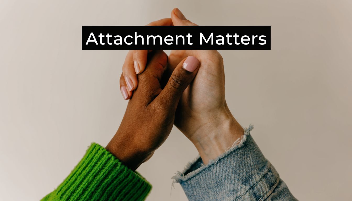 A close-up shot of two people of different skin tones holding hands, symbolizing connection and emotional support.